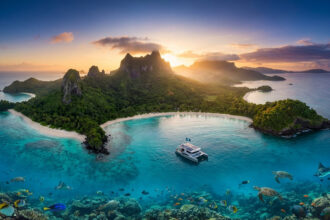 Beautiful archipelago landscape showcasing volcanic islands and lush greenery in Indonesia